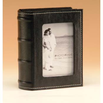 The Minimax album has a photo frame on the front cover to hold a keepsake and has black slip in
