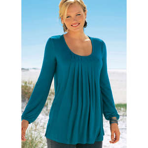 Up-to-the-minute style combined with the comfort of a stretch knit! Scooped round neckline trimmed w