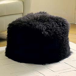 Back to thrill a new generation of comfort seekers, this occasional seat cum footstool with a suede