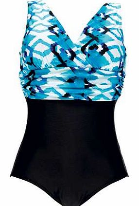 Flattering swimsuit in a striking print, printed top with plain bottom gives a sliming effect. Soft fixed cups give extra support and the front powernet lining provides a great sculptured look. Swimsuit Features: Washable 80% Polyamide, 20% Elastane 