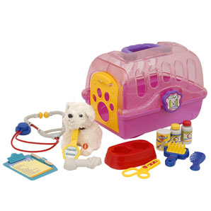 This colourful plastic pet carrier contains a soft toy puppy which barks when you press its paw