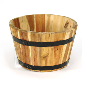 Made from acacia  this traditional wooden barrel-style planter has a superb natural finish. Coated w