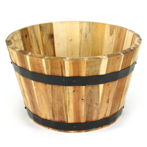 Made from acacia  this traditional wooden barrel-style planter has a superb natural finish. Coated w