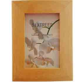 A very simple elegant natural wood photo frames holds 4 x 6 photograph