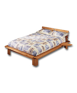 Solid pine double bed in new continental design. F