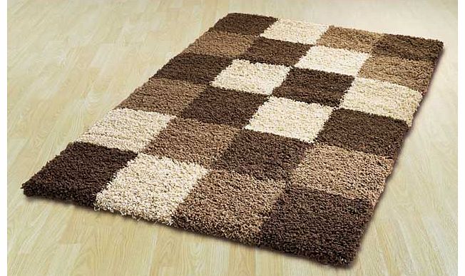 Warming blends of natural and chocolate hues add texture and depth to this Norvik block rug. The fluffy tactile rug has a friendly appeal. It is also easy-care and hard wearing. 100% polypropylene. Woven backing. Surface shampoo only. Size L190. W133