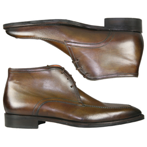 A 3 tie low cut ankle boot from Jones Bootmaker. With raised, stitched seam detail to apron and squa