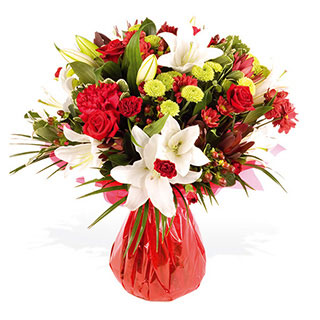 Handtied of white orientals red roses xanths standard and spray carnations with kermit leucodendron 