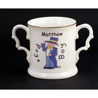 A fine bone china loving cup personalised with a name on the front of the cup and a message on the
