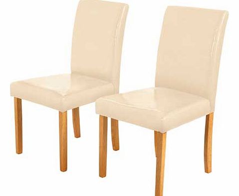 These cream leather effect chairs are a simple. stylish addition to your dining room. Featuring a quality rubberwood frame and a light. modern leather effect finish. Supplied as a pair. Seat height 46cm. Oak stain finish. Leather effect seat cover. W