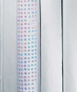 White curtains with pink sequins.Lined.Complete with tie-backs.Width 66in, drop 72in.50%