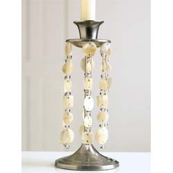Exclusive to Past Times, these pewter effect candlesticks are decorated with strings of real shell