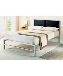 Double metal bedstead with faux leather luxury upholstered headboard. Comfort sprung