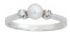 Sterling silver ring set a freshwater pearl and two white cubic zirconias