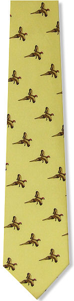 A lovely silk tie featuring pheasants flying on a yellow background.