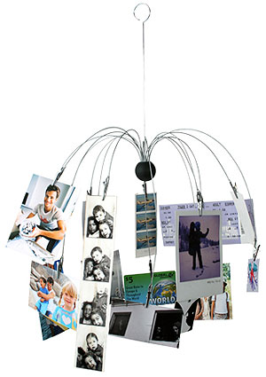 This photo clip mobile is a perfect way to show off your pictures. And what a great way to hang up y