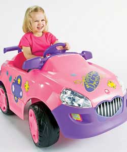 Pink battery car 6V with working radio and forward and reverse control on steering wheel. Automatic