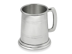 A traditional half pint tankard in a plain design with lines around top and bottom.