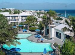 The Playamar Apartments are centrally located opposite the beach in Puerto Del Carmen. The resort ce