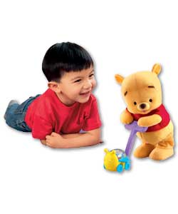 Baby Pooh encourages kids to help him walk slowly and then faster while pushing his popping bumble