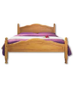 Cinnamon antique stain finish. Shaped headboard and foot end with sculptured posts and inlaid