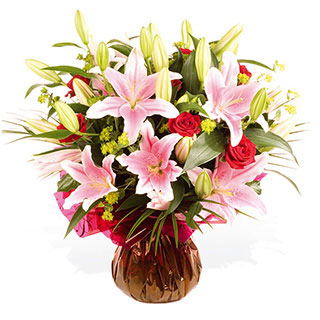 Soft scented Oriental Lilies with stunning velvety Red Roses make this bouquet very special and a jo