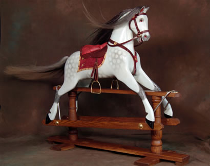 This exquisite hand-made rocking horse will provide years of fun for the both the young and the
