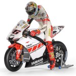 Minichamps has released a 1/12 Valentino Rossi sitting figure from Valencia 2005 in a `burn-out` pos