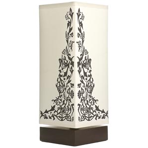 A dark wood base and ivory shade with brown floral pattern