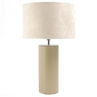 A contemporary table lamp with a warm cream faux leather cylindrical base and a plain cream faux sue
