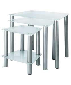 Silver coloured metal frame with frosted tempered glass top. Size of largest table (W)57, (D)40,