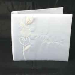 Beautiful padded satin covered wedding album with embroidered rose on the front