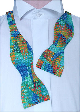 An attractive mosaic patterned self-tie bow tie in yellows, greens and blues.