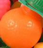 Sherbet Filled Fruits - plastic fruits filled with sweet powdered candy.