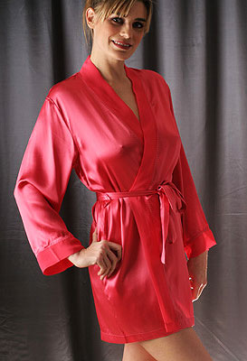 Feel utterly pampered and spoilt in this knee-length robe in rose-coloured silk from Silk Cocoon. Ed