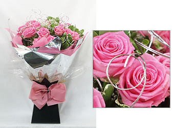Twenty top quality pink Roses and Gypsophila