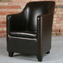 The Sontana club leather armchair features a combination of curved and straight lines to give this