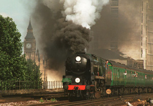 Hauled by a majestic 1940s steam locomotive, sit b