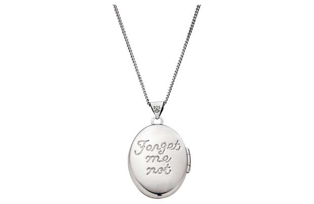 A solid curb chain holds a locket with Forget me not engraved on the back. Sterling silver. Cubic zirconia set pendant. Length of necklace 46cm/18in. Pendant size H21