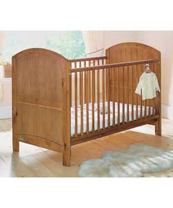 Converts to junior bed. 3 position height adjustable base. Dropside. Teething rails. Crafted from
