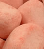 Strawberry Bonbons - A strawberry toffee centre in a crisp casing and a dusting of sweet strawberry 