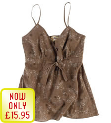 With a kitsch bow and funky flower print, this cami is understated glam at its best. 100 Cotton