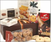 Smart chocolate coloured lidded gift box with contrasting ribbon includes - Glace Cherry Shortbread 