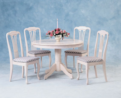Round pedestal table in the Empire style with four elegant Queen Ann style chairs upholstered in