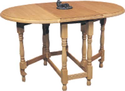 Country pine oval gateleg table. Both ends can be stored in down position to save space when not in