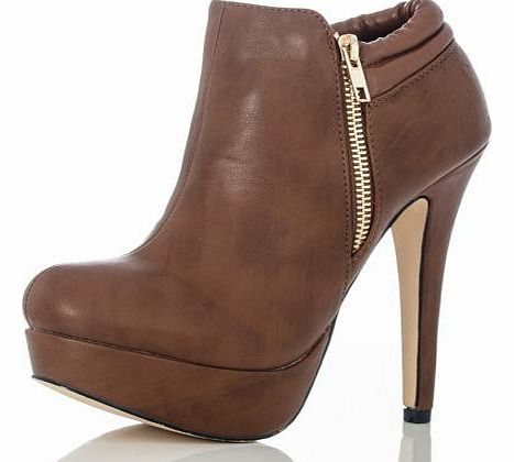 These high heel shoe boots are super stylish with a distinctive leather look material. A high heel shoe boot with the double sided zip feature, these are a must have. Wear with skinny jeans and faux fur biker jacket for a killer look. - PU leather li