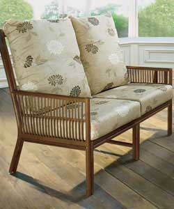 Stained rattan frame with rail effect design and 100% cotton cushion covers.Foam-filled seat