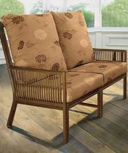 Stained rattan framr with rail effect design and 100% cotton cushion covers.Foam-filled seat