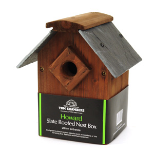 A handsome  slate roofed nesting box  perfect for attracting wild birds. Members of the tit family  