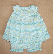 Lovely little sleeveless sundress with matching pants in turquoise blue wit